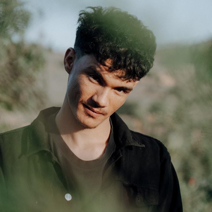 Portrait of Alex Renner, community mentor and Italian cuisine guide